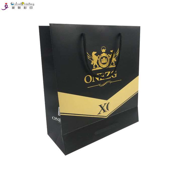 El regalo impreso aduana del sellado de oro empaqueta los bolsos de papel del vino con grueso de las manijas 0.2m m